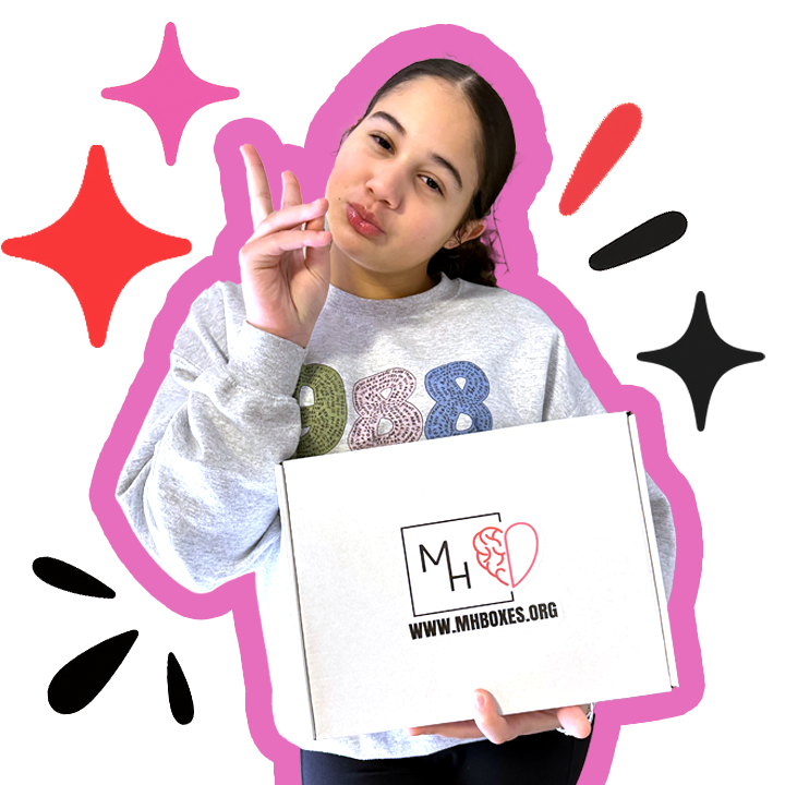 Youth mental health advocate Mila holding an MH Boxes care package.